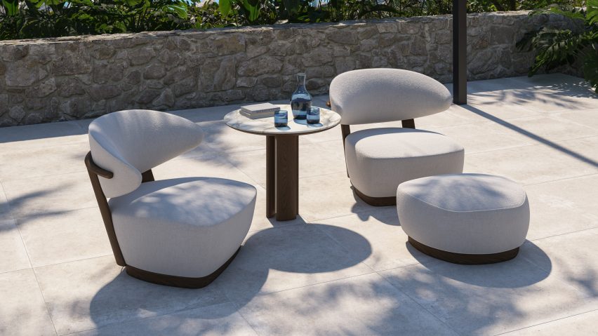 Two pebble-shaped chairs are pictured outside
