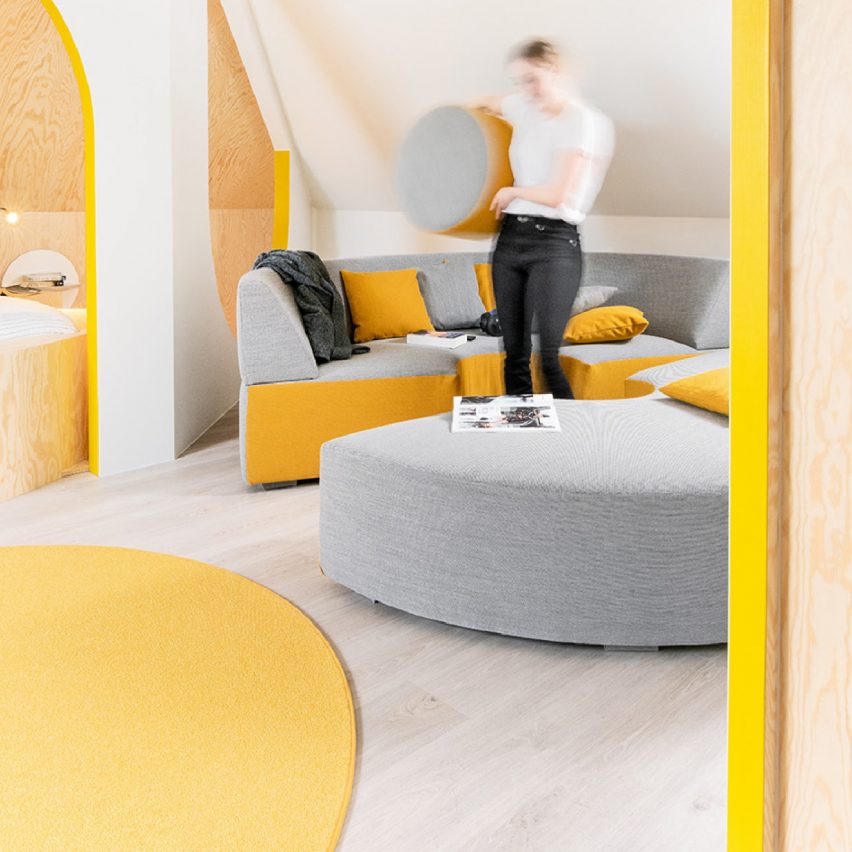 Relaxing geometry with touches of yellow by Van Staeyen Interieur Architecten