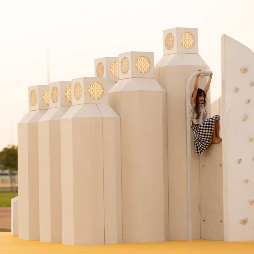 Girl climbing playground version of the Qatar University