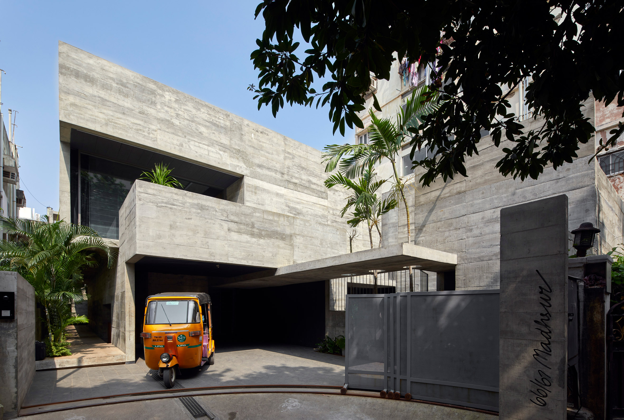 Exterior of concrete house in India by Matharoo Associates