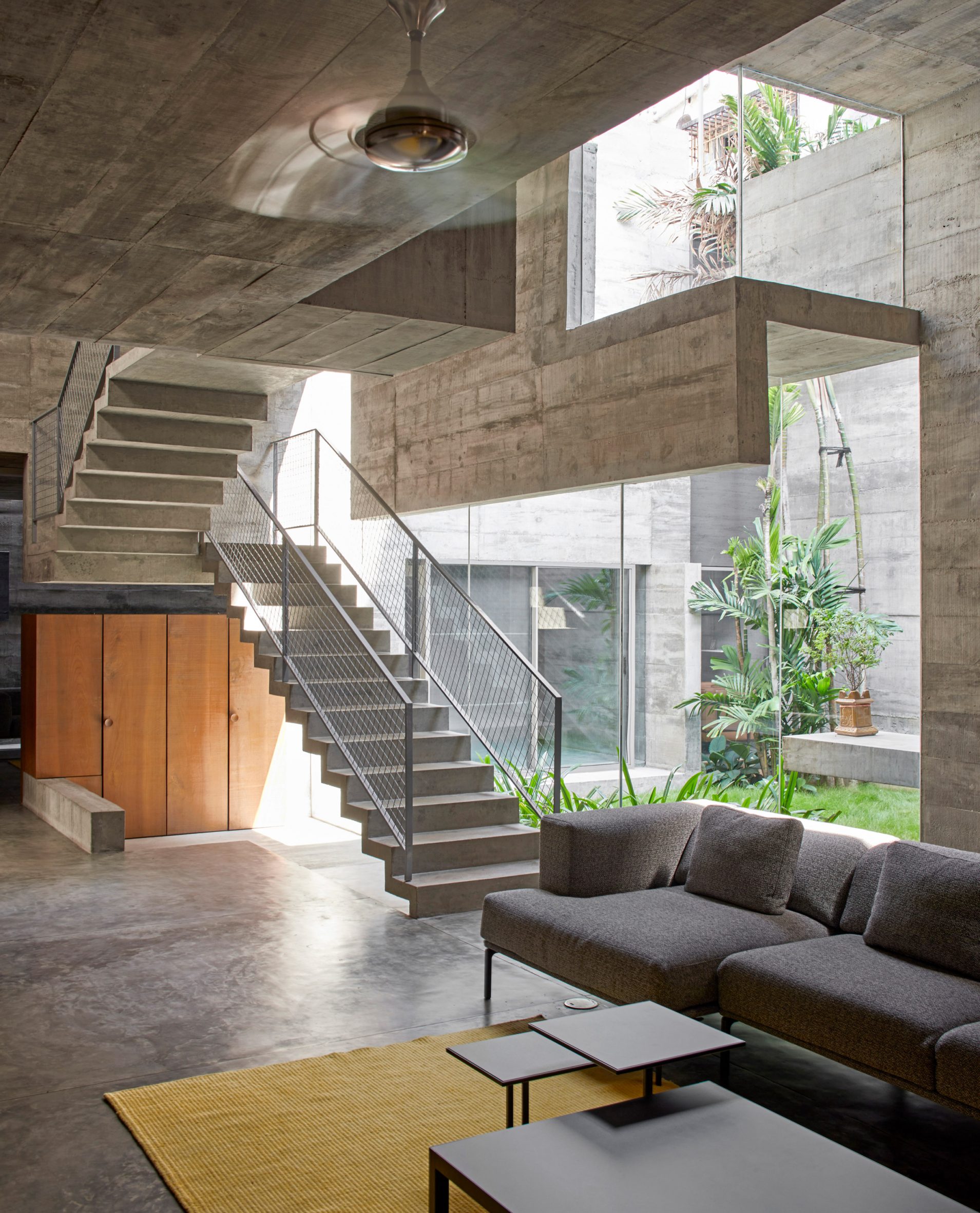 Interior of concrete house in India by Matharoo Associates
