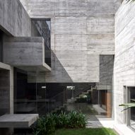 Matharoo Associates folds concrete home in India around courtyards