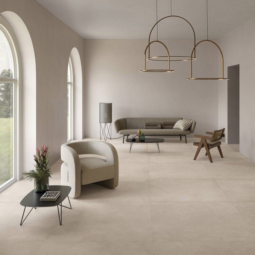 Geo tiles by Ceramiche Keope in a neutral living room with arched windows