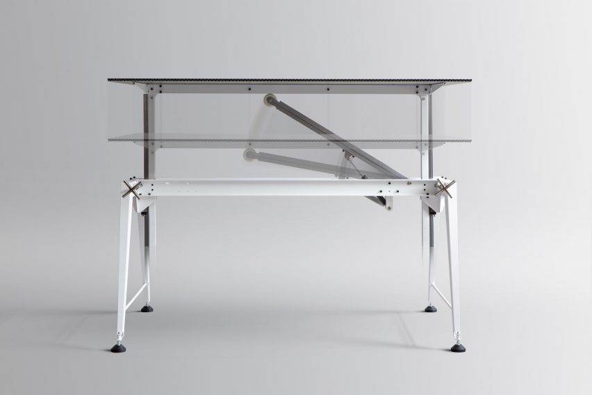 Photo of the Gas Spring Table with motion blur showing the tabletop moving