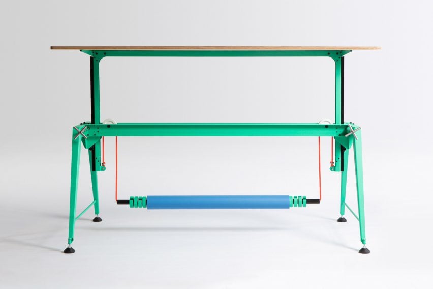 Photo of the Counterweight Table in green with a blue counterweight, red rope and wooden tabletop