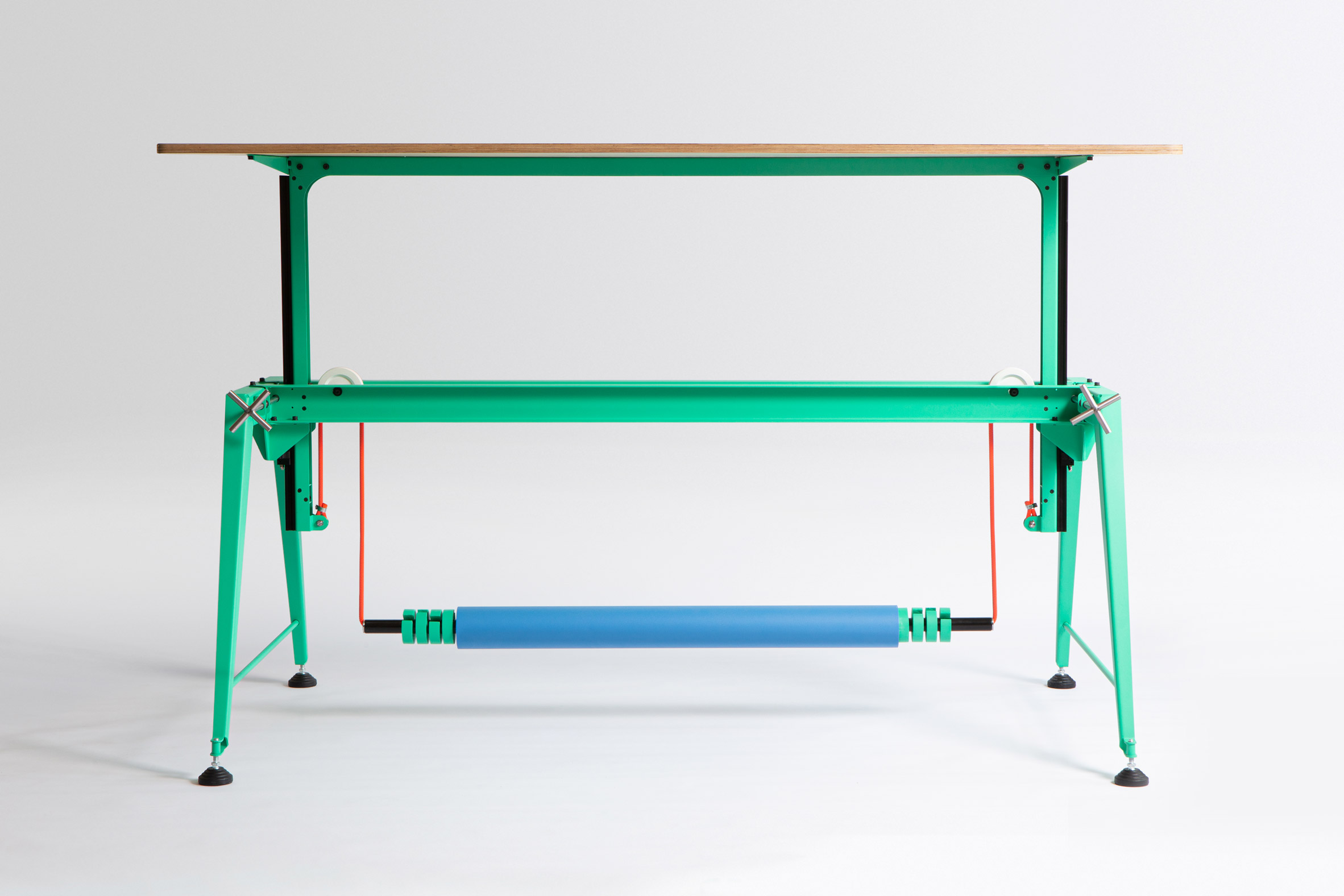 Photo of the Counterweight Table in green with a blue counterweight, red rope and wooden tabletop
