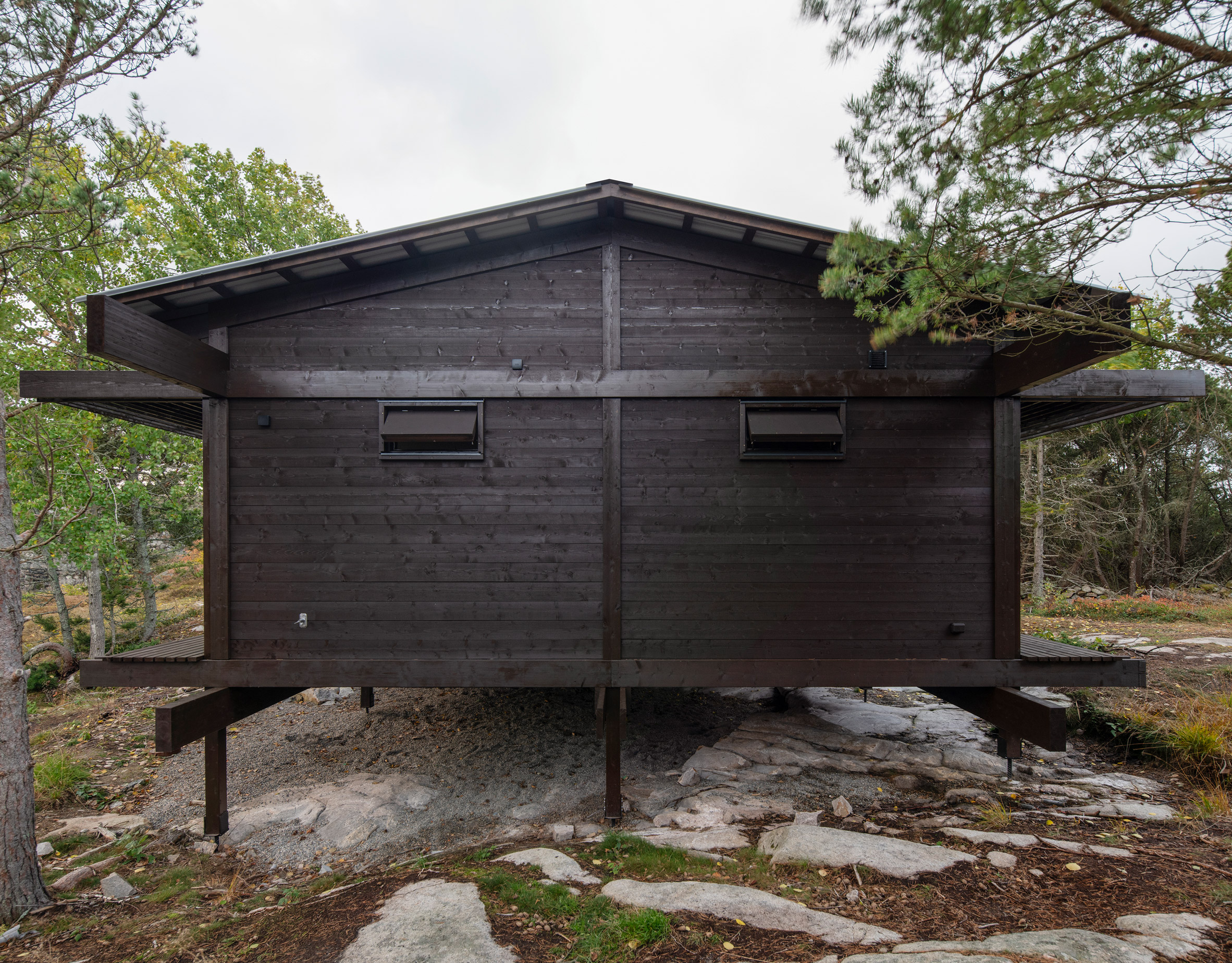 Tar-coated cabin in coastal Sweden