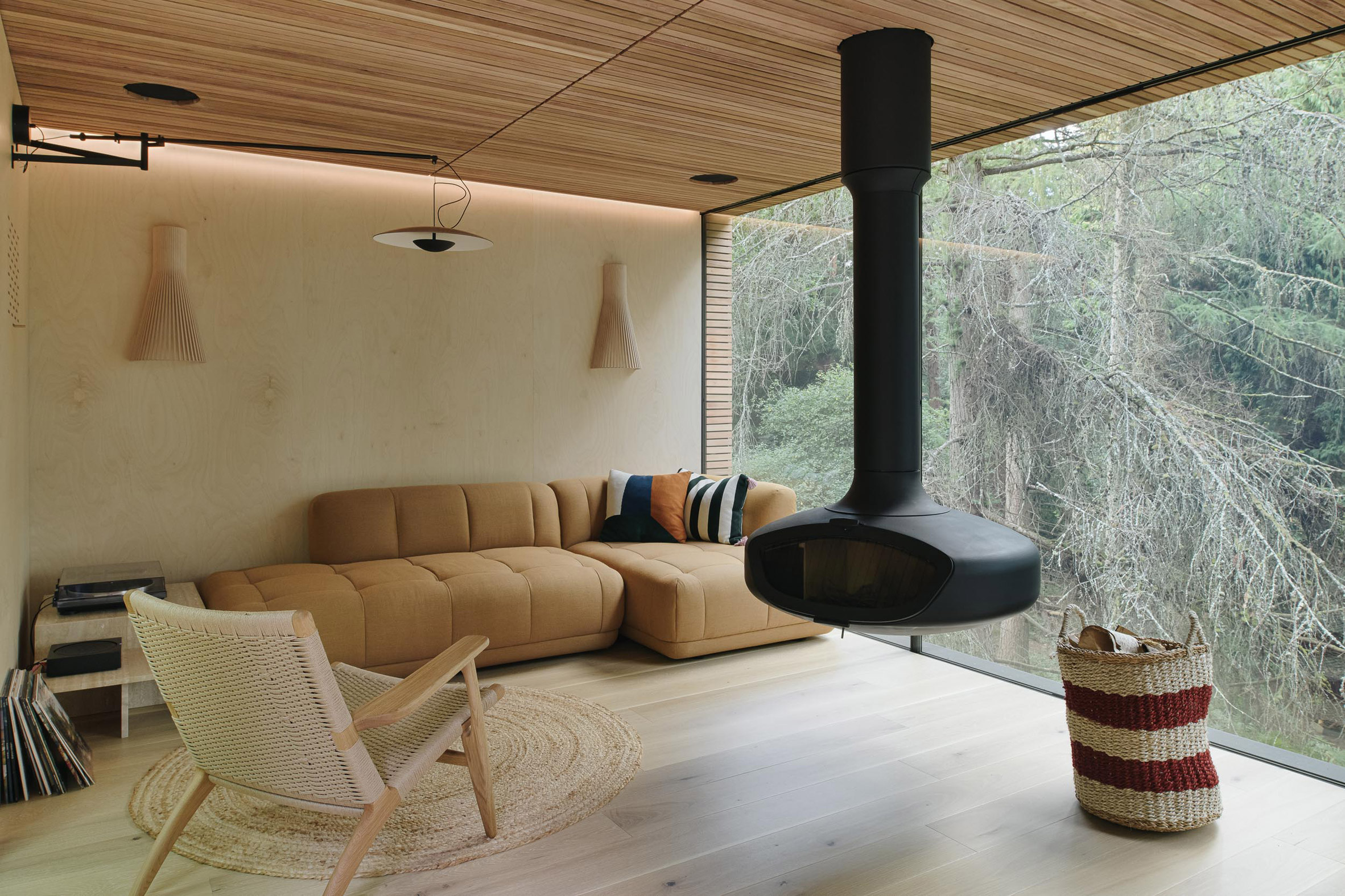 L-shaped sofa and armchair inside cabin living space