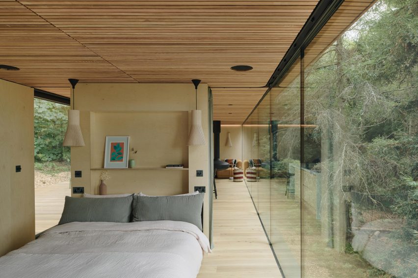 View of bedroom with glass wall