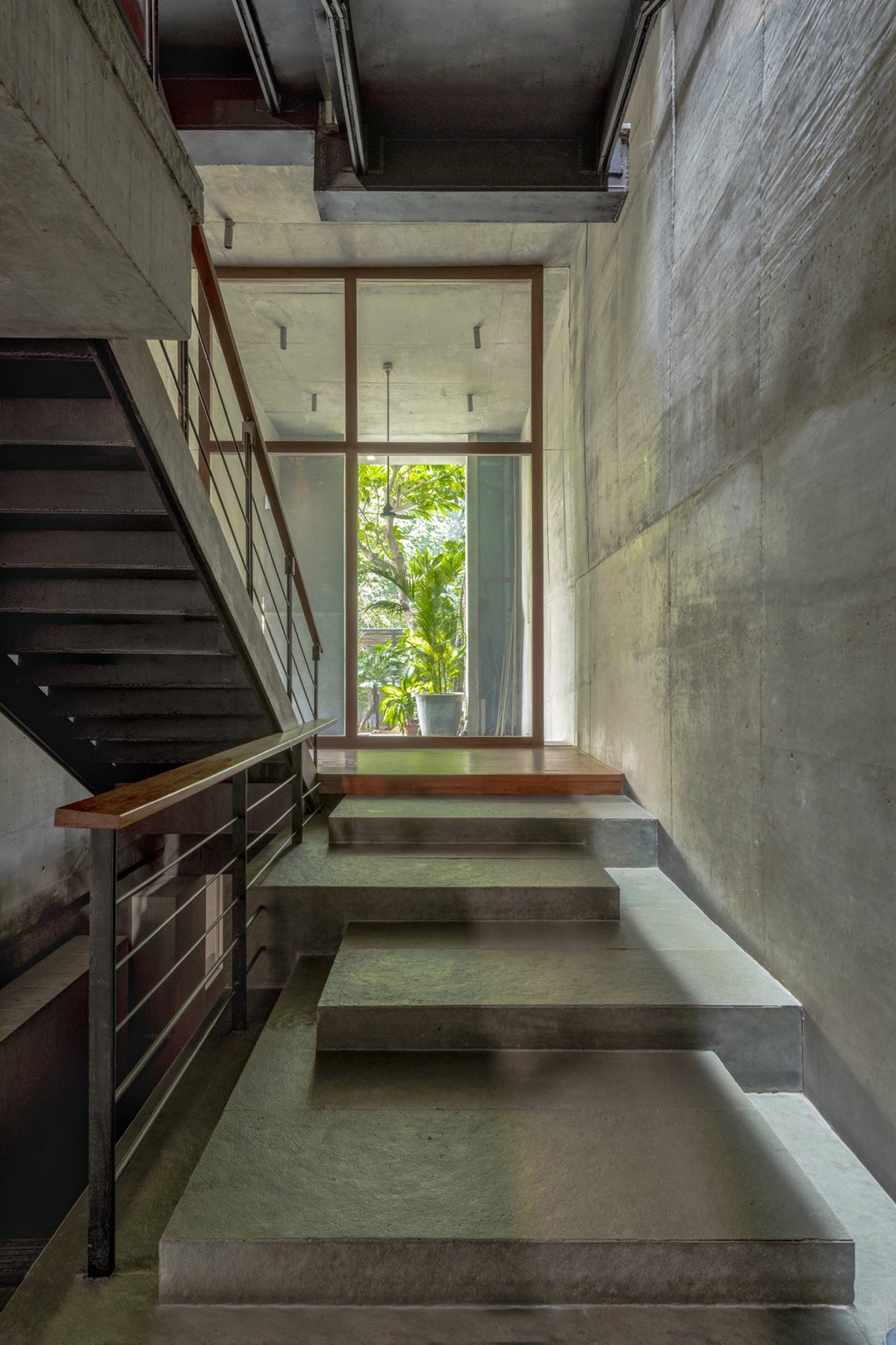Interior staircase at House of Voids by Malik Architecture