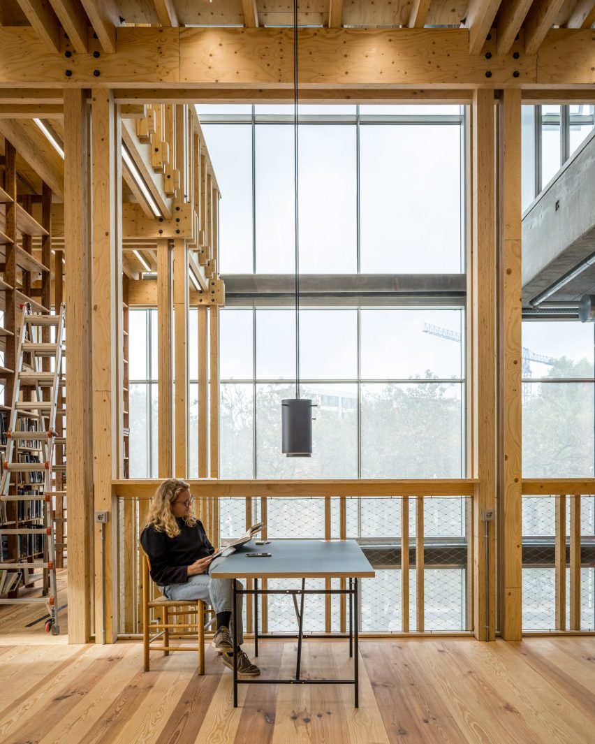 Timber-framed library at the new Aarhus School of Architecture building by Adept
