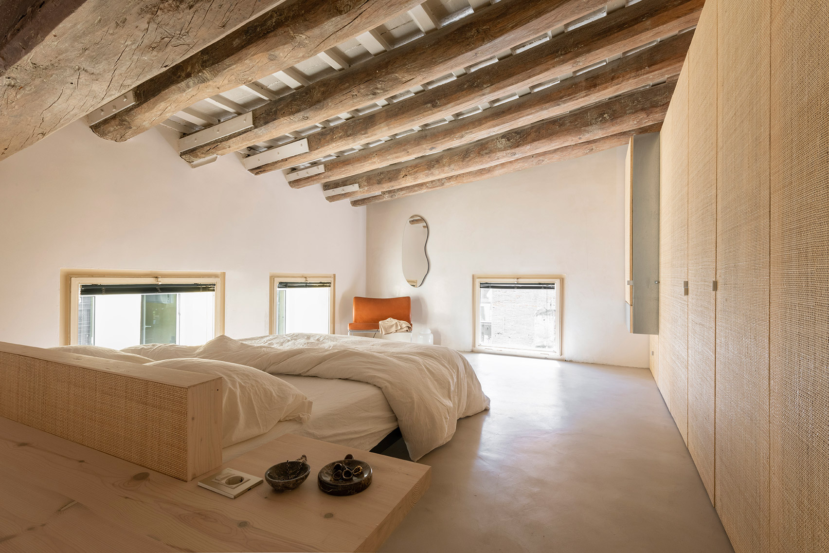 Bedroom interior of Palau apartment by Colombo and Serboli Architecture