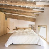Bedroom interior of Palau apartment by Colombo and Serboli Architecture