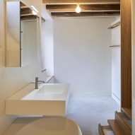 Bedroom and bathroom in Rustic Renovation by Enrico Sassi
