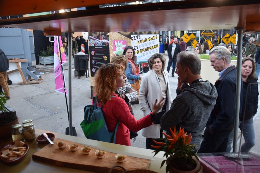 Visitors at a food stall at Dutch Design Week