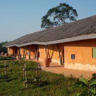 Localworks builds irregularly shaped classrooms with earthbags for school in Uganda