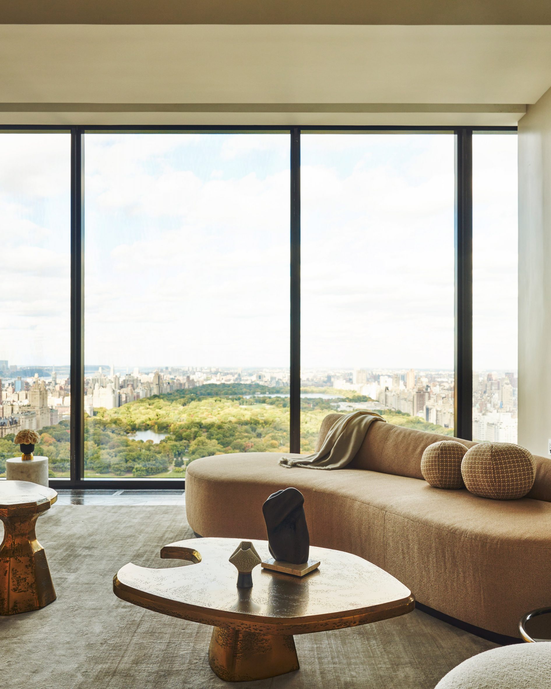 Steinway tower interiors with modern furniture and view of central park