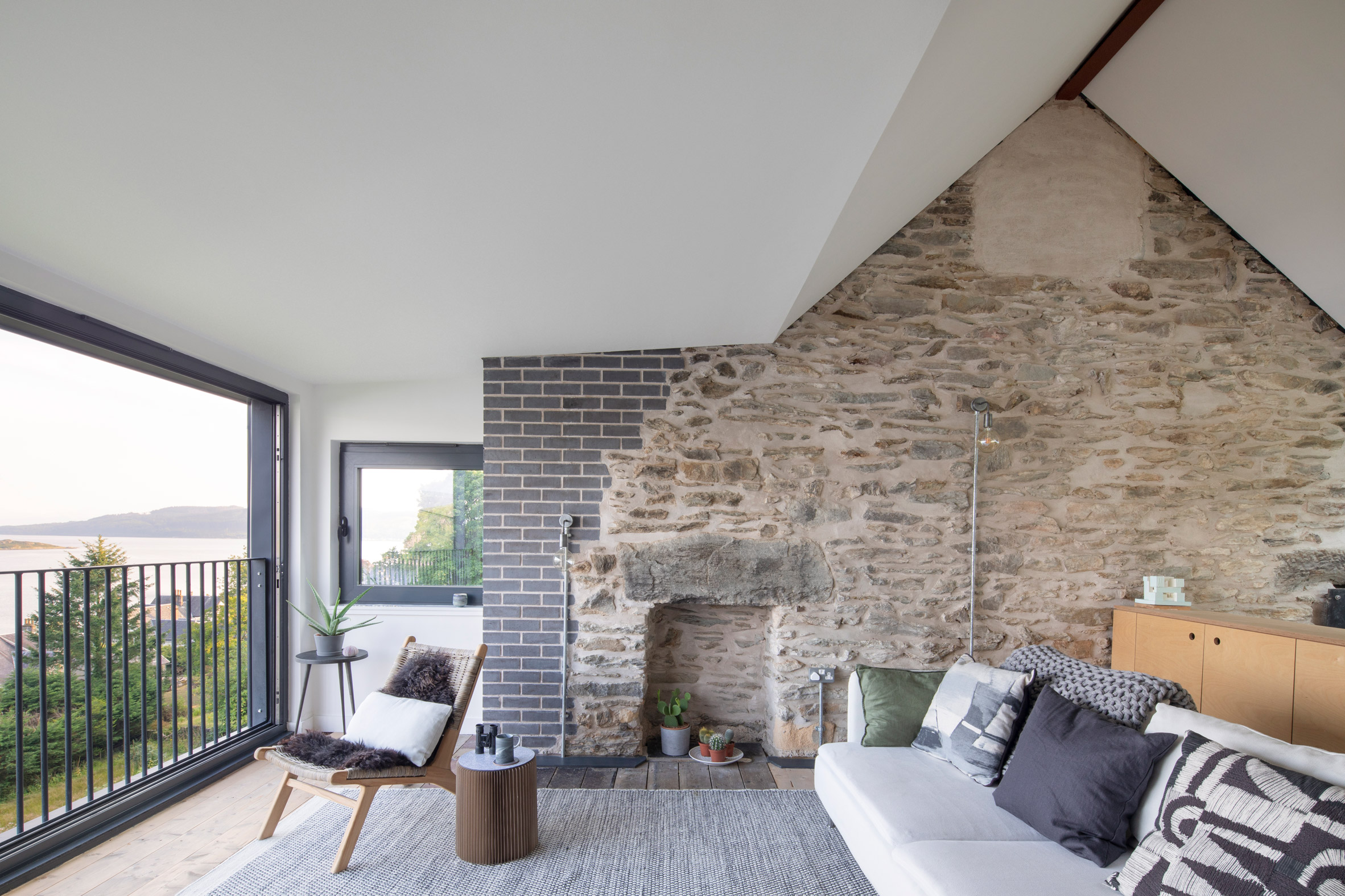 Living area of stone house by Technique