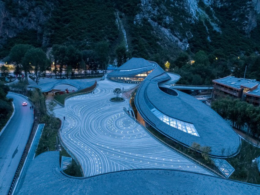 Image of the Jiuzhai Valley Visitor Center and its swirling roof shapes