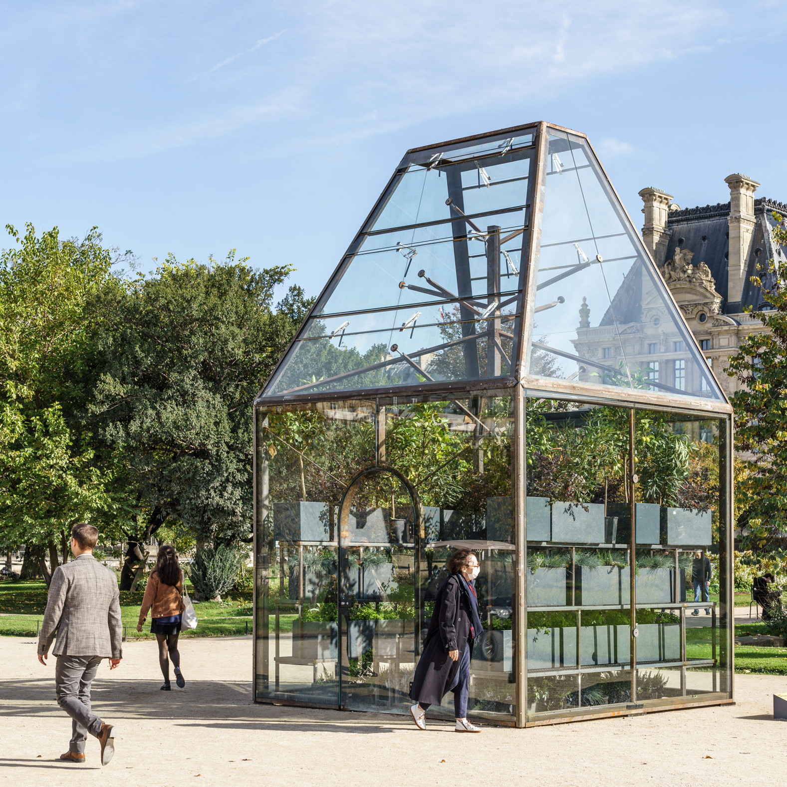 Studio Odile Decq's minimalist glass pavilion recalls traditional greenhouses