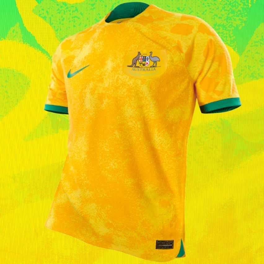 A yellow and green World Cup 2022 football shirt
