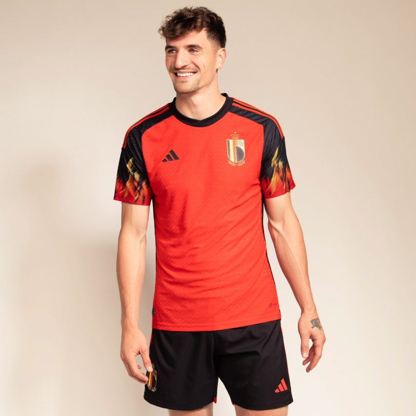 A Belgian footballer in a red shirt