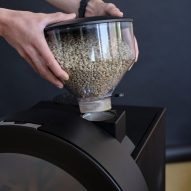 Coffee machine with large circular window on worktop