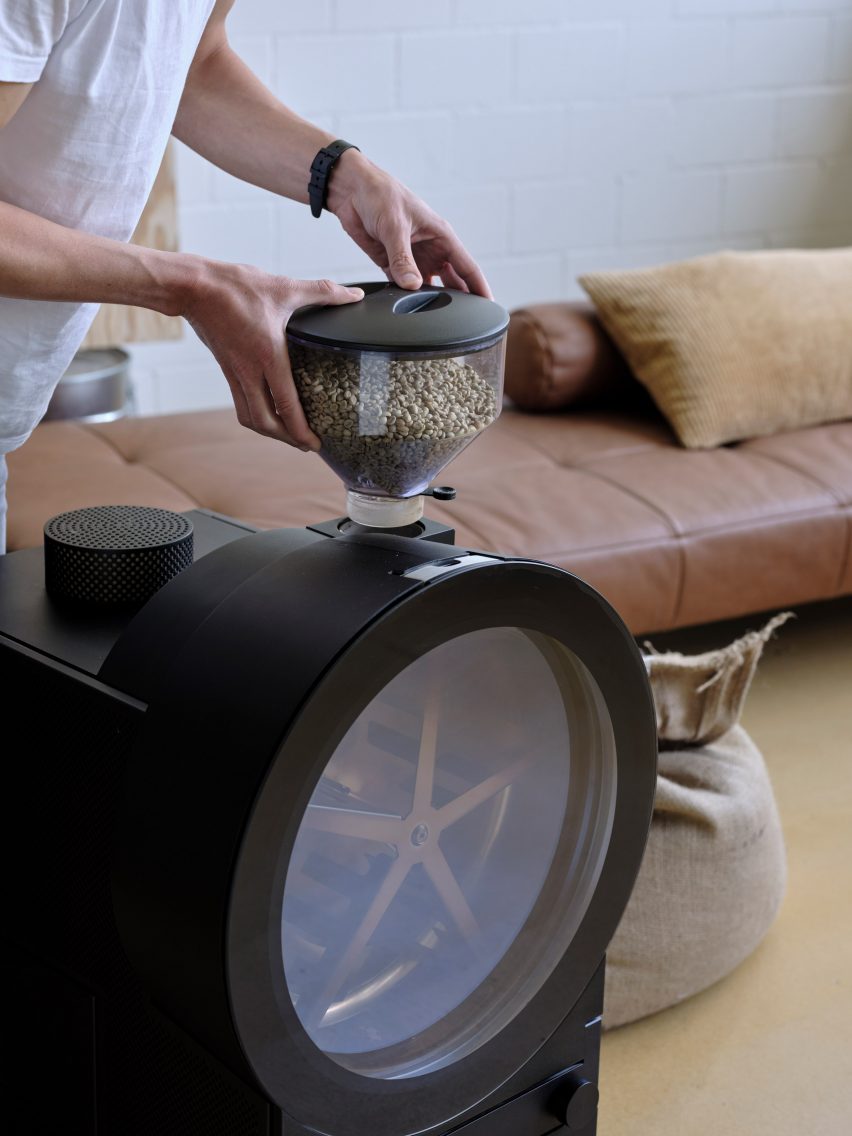 Coffee machine with large circular window on worktop