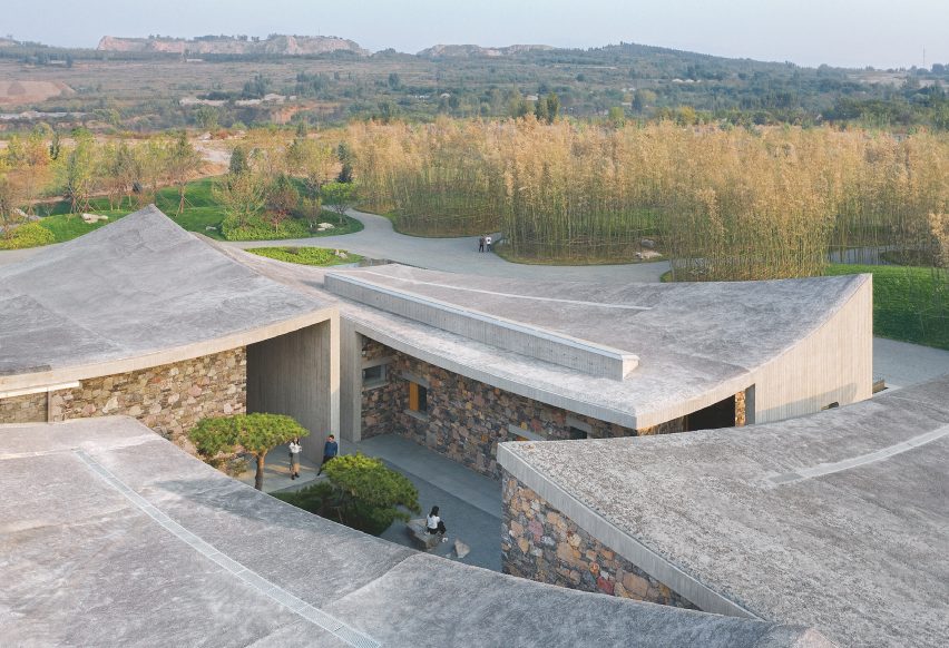 Chinese cultural centre with sweeping concrete roofs