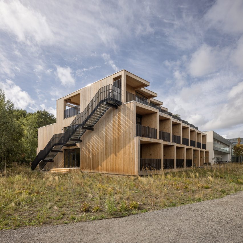 Side view of timber-framed hotel by 3XN