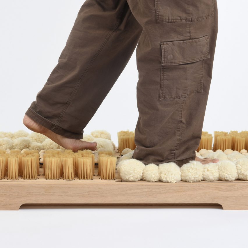 Person walking on composite board