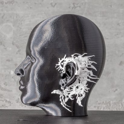 Model with jewellery design around ear