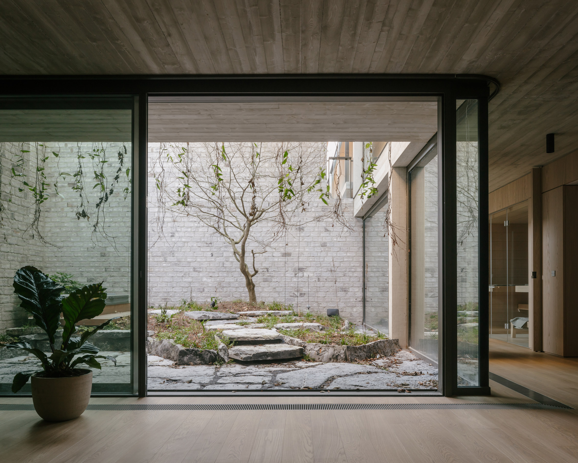 Image of a glazed courtyard at the Belgian home