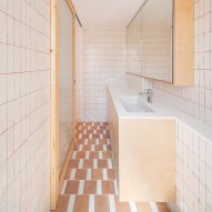 Parramon + Tahull adds tiled floors and bespoke joinery to refurbished Barcelona apartment