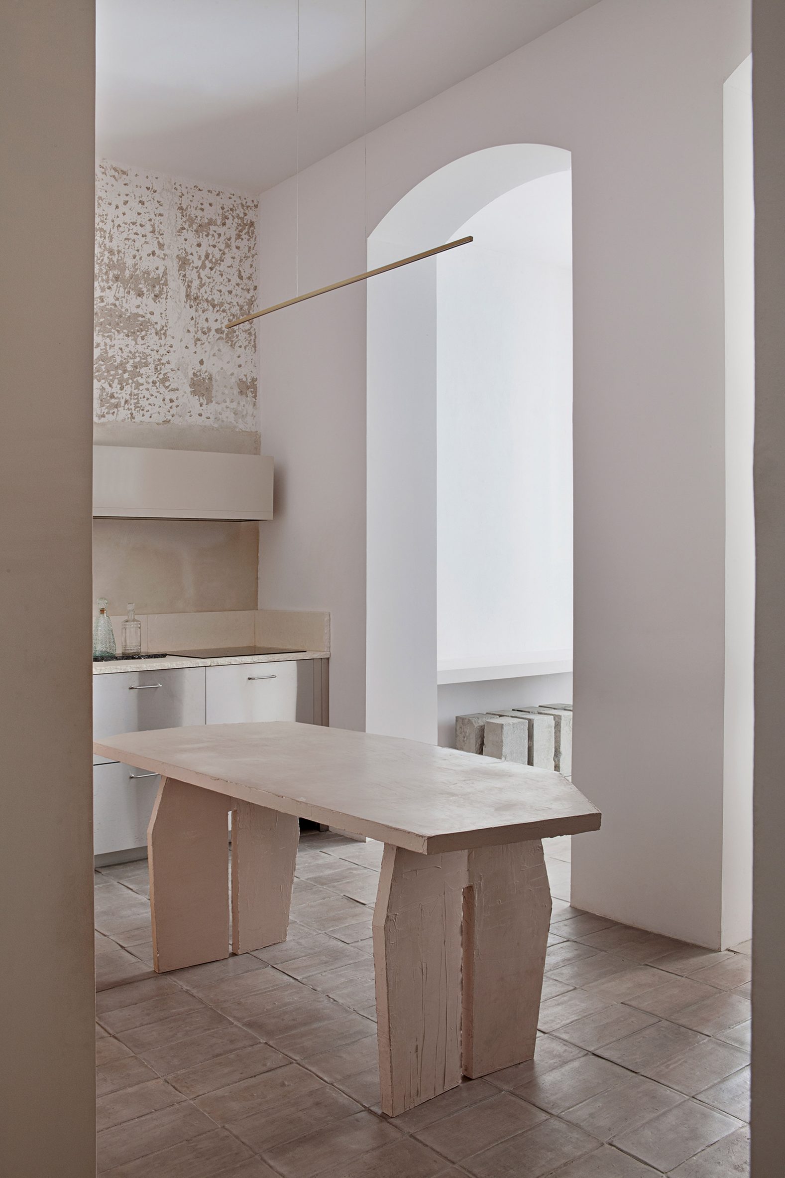 Kitchen of Casa Olivar with chunky stone dining table