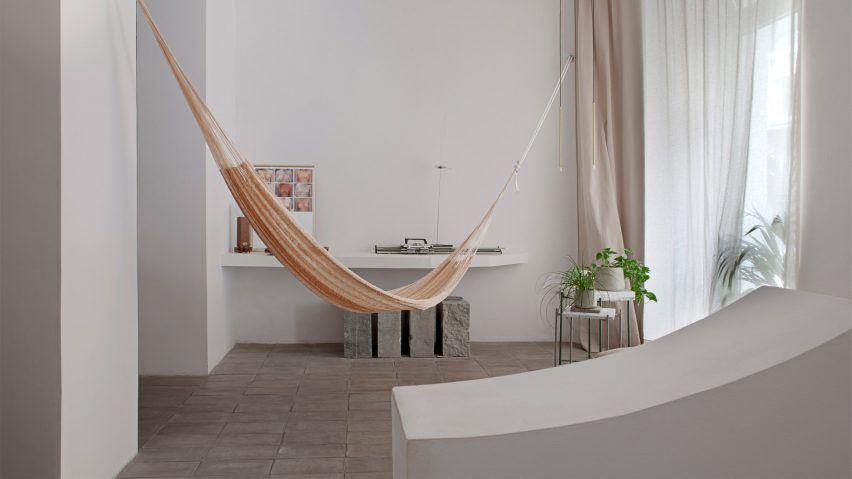 Living room with hammock in Casa Olivar in Madrid by Matteo Ferrari and Carlota Gallo