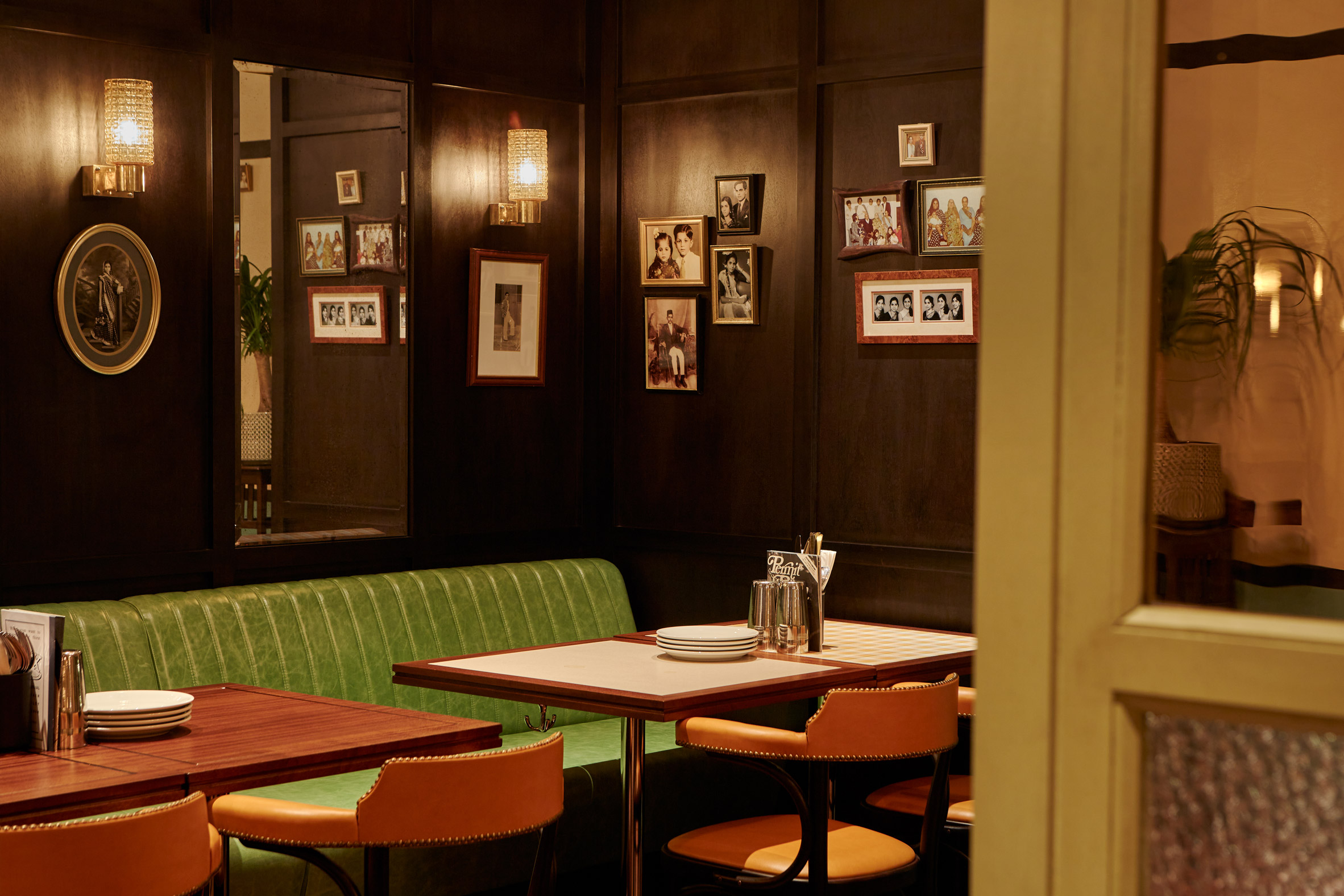 Green banquette in Dishoom Canary Wharf