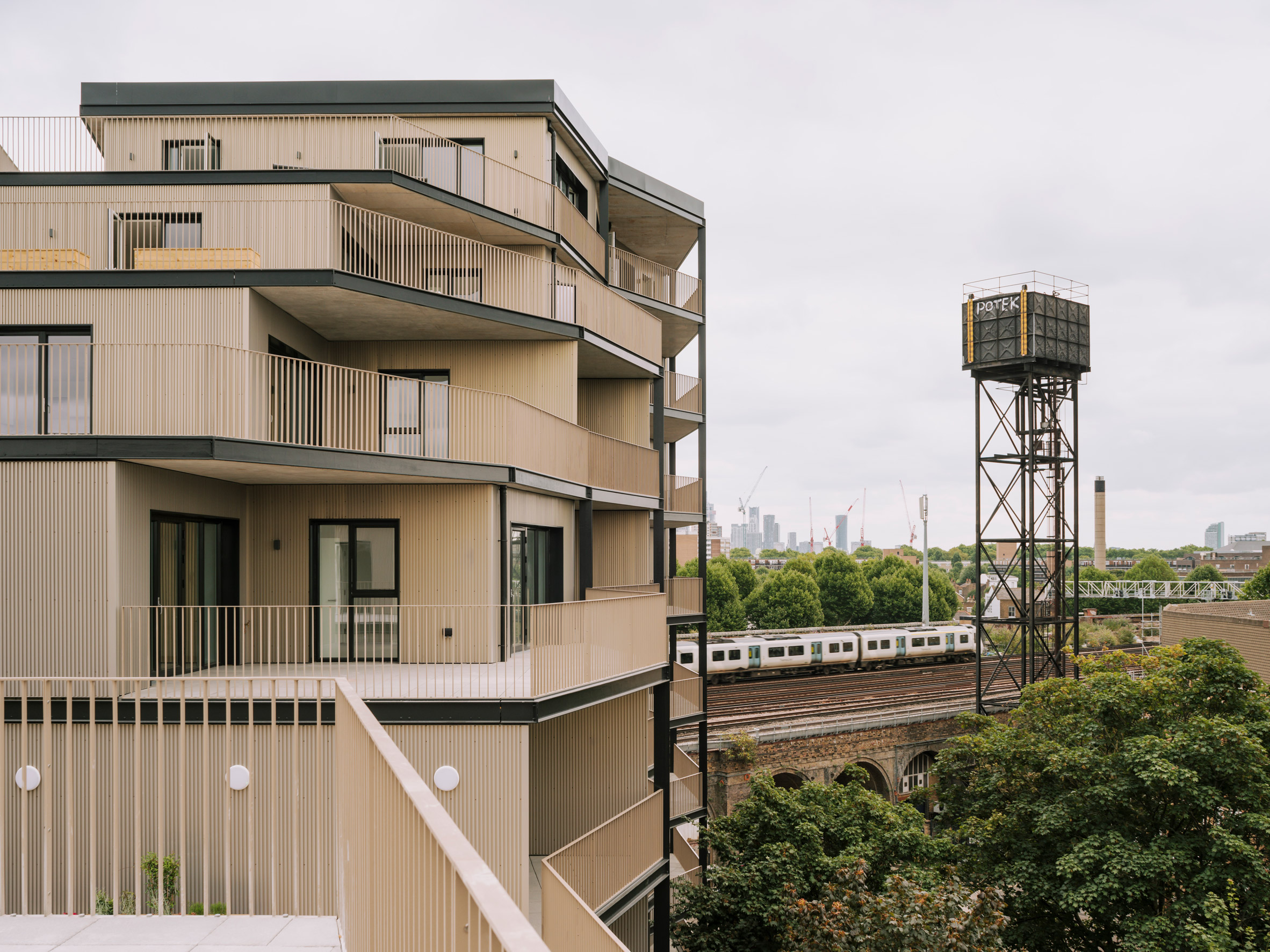 Apartments and balconies overlooking London railway line