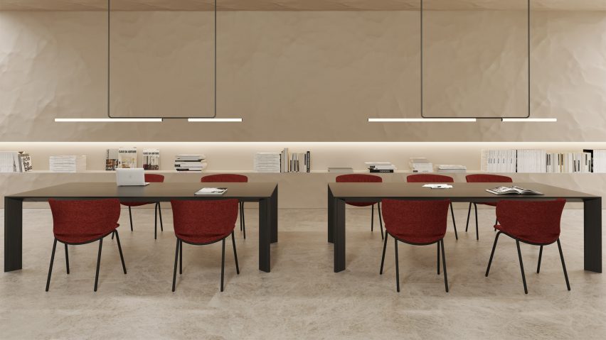 Two Foro tables by Viccarbe with red chairs