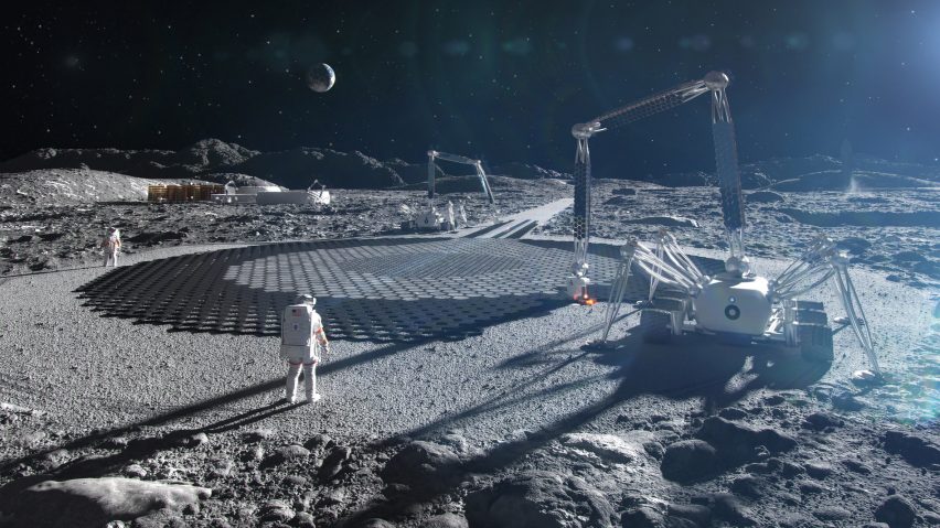 An astronaut and a construction machine on the moon