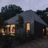 Oza Sabbeth Architects tops Hamptons house with pyramidal roofs