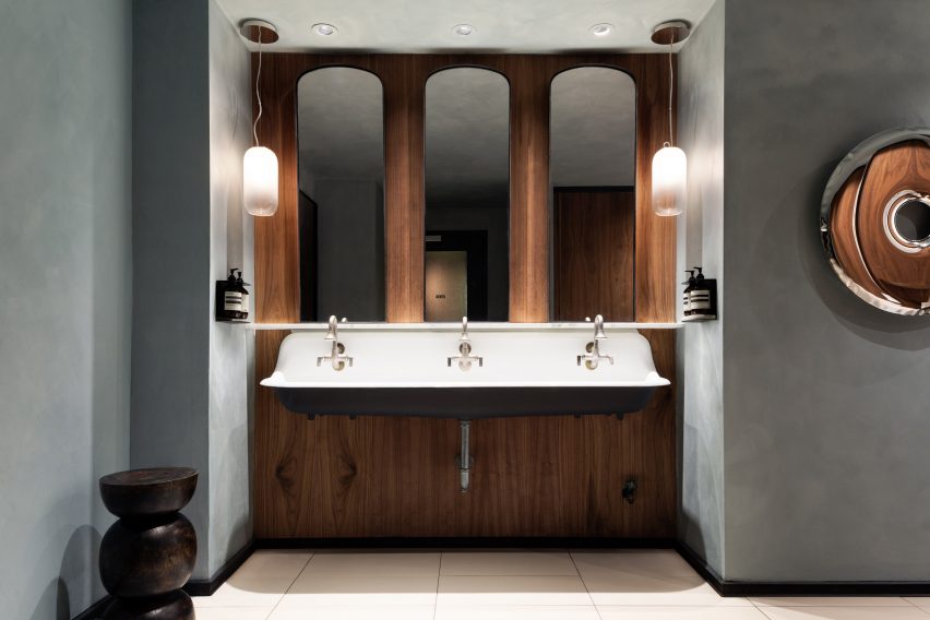 Large sink with three mirrors above