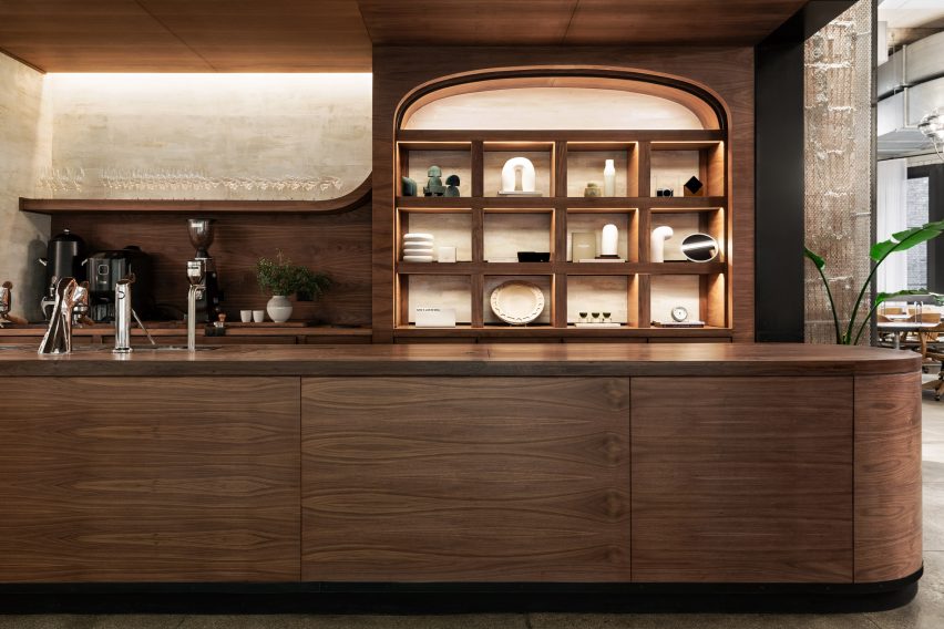 Cafe and retail space lined in walnut veneer