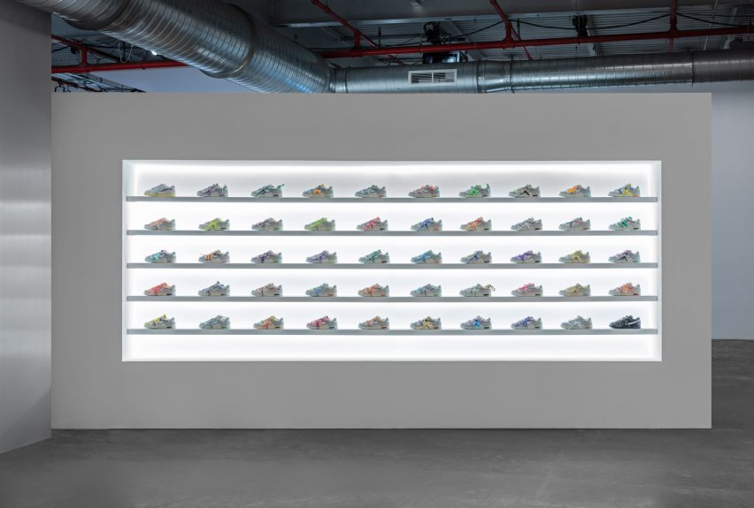 shoes are presented in a lightbox on a wall at the Virgil Abloh: The Codes c/o Architecture exhibition by Nike during Miami art week in 2022