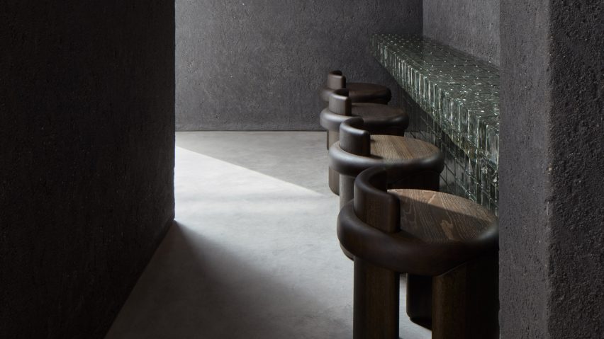 Row of stools in front of counter in Origami sushi restaurant in The Dubai Mall by VSHD Design