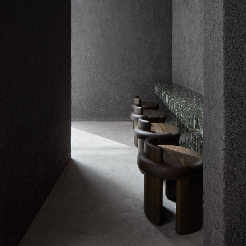 Row of stools in front of counter in Origami sushi restaurant in The Dubai Mall by VSHD Design