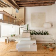 Living area of Palau apartment by Colombo and Serboli Architecture