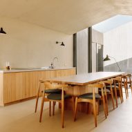 Dining table in Pateos houses by Manuel Aires Mateus