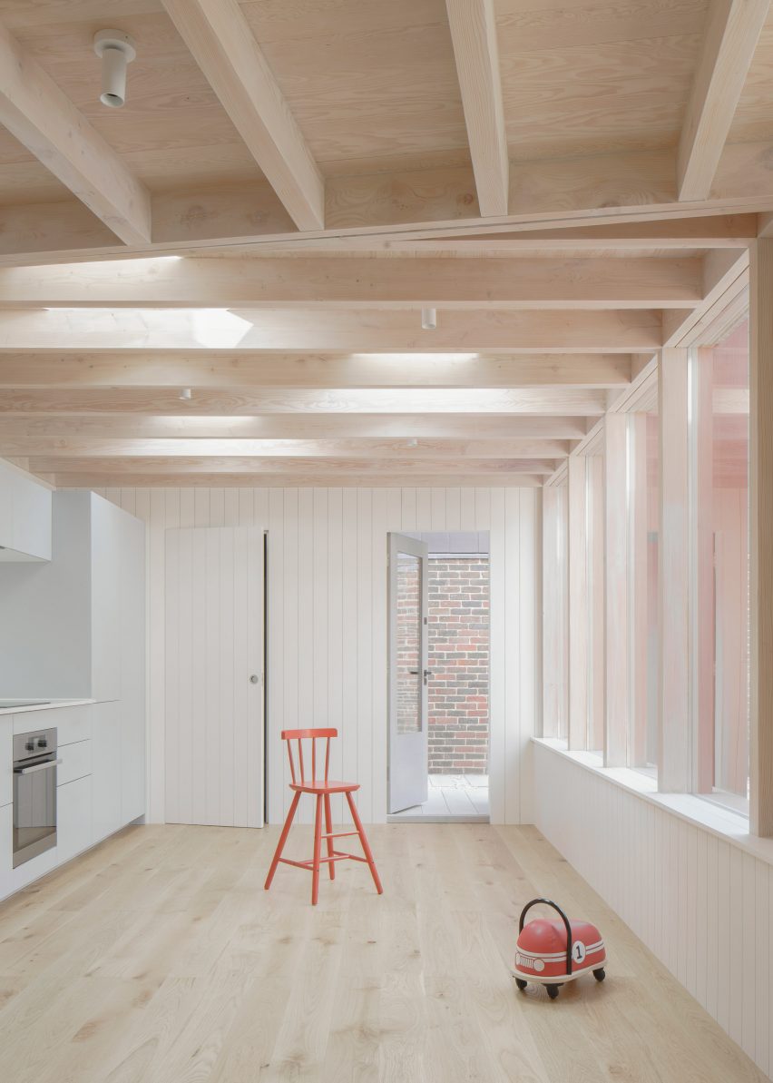 Room with wooden floors and ceiling