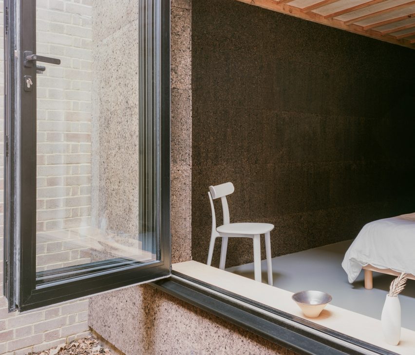 Image through a window to a bedroom at the east London home